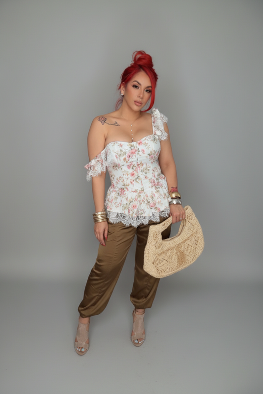 LA ROSETTA PEPLUM TOP
