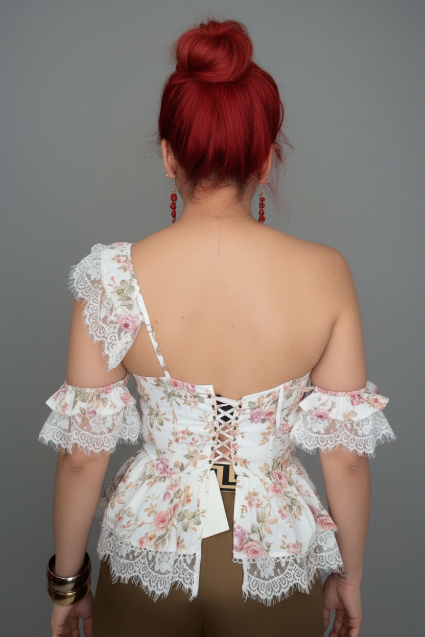 LA ROSETTA PEPLUM TOP